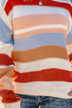 Maglione con spalle scese a girocollo color block a righe rosa