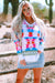 Maglione bianco azziciantato con stampa aztec di grandi dimensioni