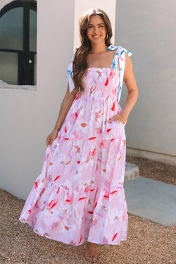 Robe maxi à l'épaule nouée à imprimé floral rose
