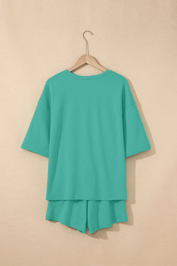Meadow Mist Green Solid Sole Lo suelto V Neck Media manga y pantalones pantalones cortos