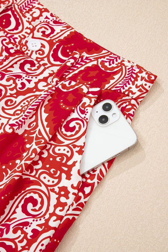 Pantaloni gambe a vita alta stampati con stampato rosso paisley