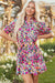 Mini-robe fleurie rose à manches courtes et col en V
