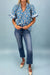 Blusa de manga curta com estampa floral azul com botão e gola listrada
