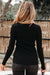 Maglione di spalla fredda a costola nera