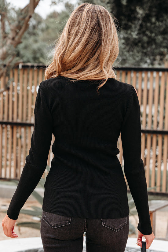 Maglione di spalla fredda a costola nera