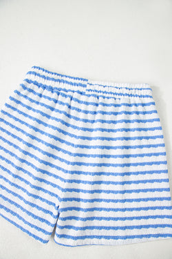 Tapa de manga corta de punto negro y pantalones cortos con cordón
