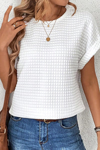 Camiseta de manga de murciélago con textura blanca a cuadros