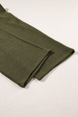 Champe boutonnée texturée de couleur unie noire et pantalon décontracté