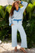 Ensemble haut pull à col à rayures bleu ciel et pantalon à cordon de serrage