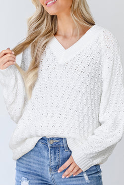 Maglie sciolta a costine a costine a costine con maglia bianca