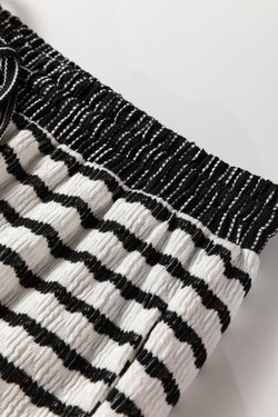 Top pullover con colletto a strisce bianche e set di pantaloni da coda