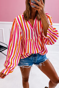 Manga de rayas de naranja con muescas con muescas en v cuello abotonado blusa frontal