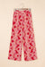 Pantaloni gambe a vita alta stampati con stampato rosso paisley