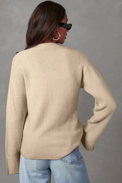 Pergamena a trama solida a tetratura a maglia split a goccia maglione sciolto