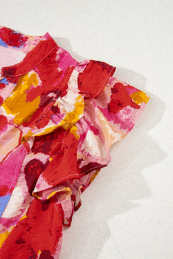 Camicetta a manica corta con rotama a vcalia azziata rossa