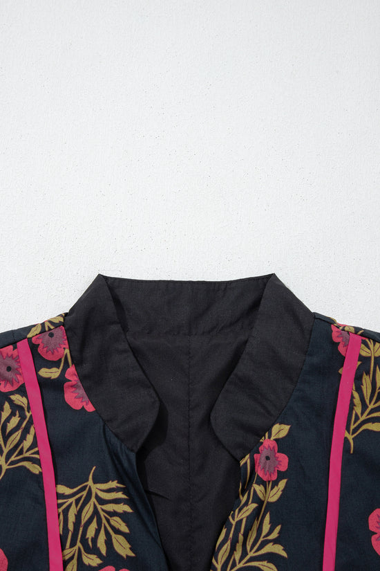 Robe babydoll noire à imprimé floral et col cranté avec bordure passepoilée et manches bracelet
