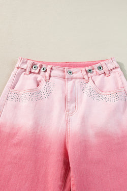 Pantaloni in denim rosa scattering di strass