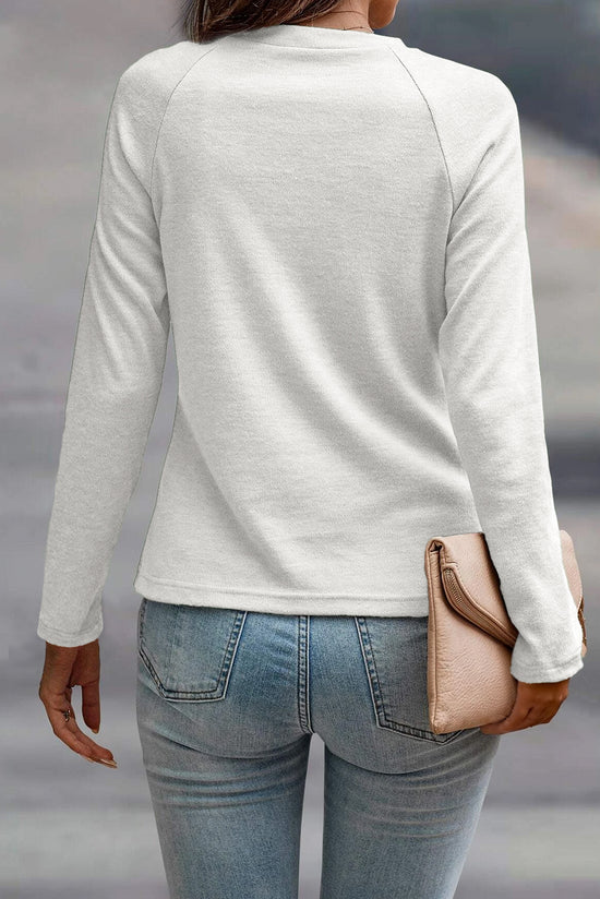 Couleur de couleur unie blanche détaillé Raglan Top à manches longues