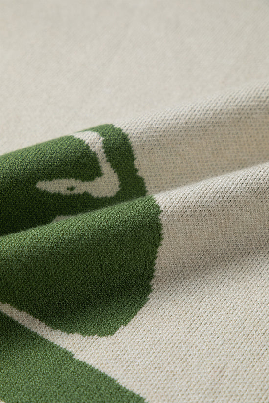 Suéter largo bege com estampa de flores em negrito e manga larga