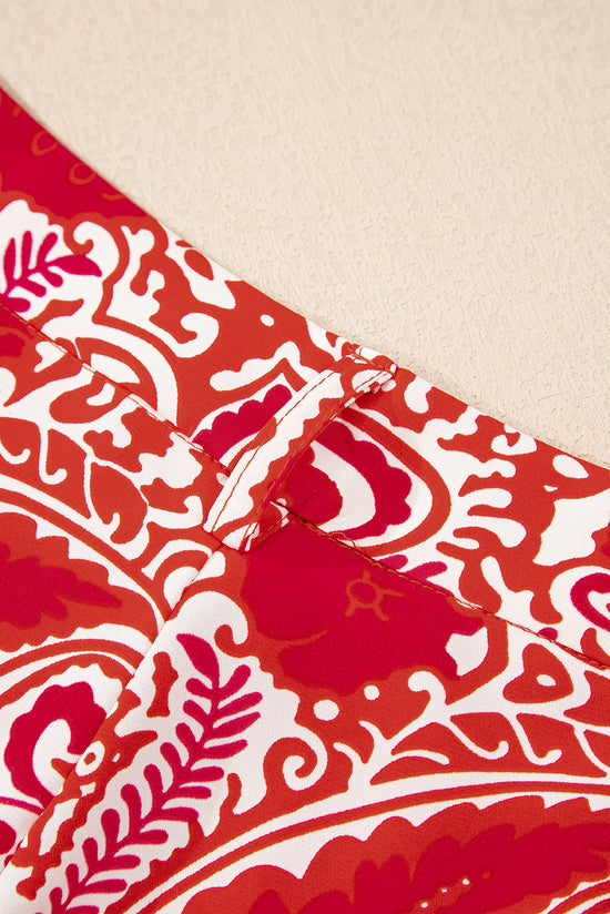 Pantaloni gambe a vita alta stampati con stampato rosso paisley