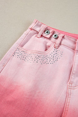 Pantaloni in denim rosa scattering di strass