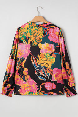 Camicetta con scollo a V e maniche a sbuffo con polsini smock con stampa floreale nera