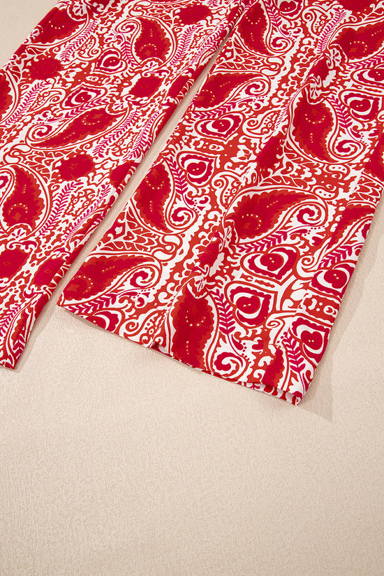 Pantaloni gambe a vita alta stampati con stampato rosso paisley