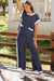 T-shirt à empoche de couleur bleu marine et pantalon de jambe large