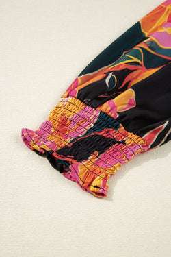 Camicetta con scollo a V e maniche a sbuffo con polsini smock con stampa floreale nera