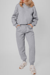 Casas sólidas grises expuestas sudaderas y corredores activos set de ropa activa