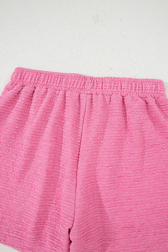 Taglie e pantaloncini a Viatura a Vagiatura arancione e pantaloncini