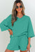 Meadow Mist Green Solid Sole Lo suelto V Neck Media manga y pantalones pantalones cortos