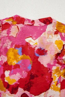 Camicetta a manica corta con rotama a vcalia azziata rossa