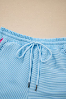 Strawberry rosa Detalle a rayas Flutter manga collar con cremallera juego corto