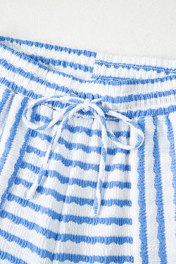 Tapa de manga corta de punto negro y pantalones cortos con cordón