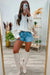 Chemise ample boutonnée blanche à manches lanternes et texture froissée