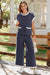 T-shirt à empoche de couleur bleu marine et pantalon de jambe large