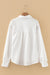 Chemise ample boutonnée blanche à manches lanternes et texture froissée