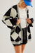 Striscia rosa colorblock goccia con spalla abbottonata cardigan