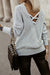 Maglione grigio a croce hollow-out