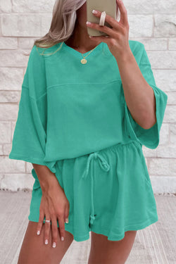Meadow Mist Green Solid Sole Lo suelto V Neck Media manga y pantalones pantalones cortos