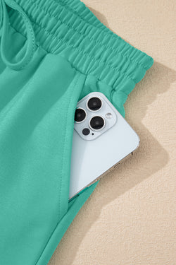 Meadow Mist Green Solid Sole Lo suelto V Neck Media manga y pantalones pantalones cortos