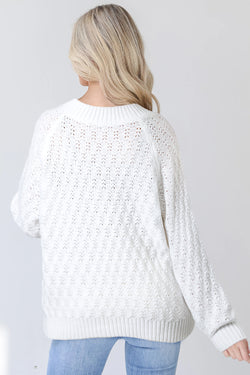 Maglie sciolta a costine a costine a costine con maglia bianca