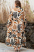 Robe longue droite imprimée abstraite de grande taille à col contrasté et col fendu de grande taille blanche