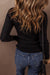 Cardigan con maglione con colletto a coste nere a costola