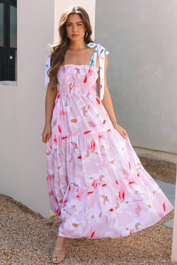 Robe maxi à l'épaule nouée à imprimé floral rose