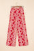 Pantaloni gambe a vita alta stampati con stampato rosso paisley