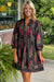 Robe babydoll noire à imprimé floral et col cranté avec bordure passepoilée et manches bracelet