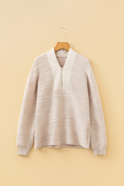 Sudadera con cuello en V y cremallera texturizada de color liso pergamino