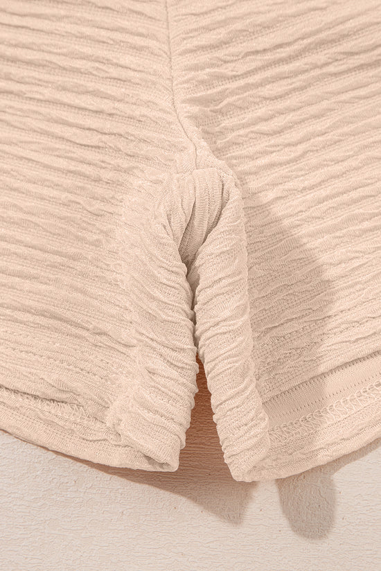 Taglie e pantaloncini a Viatura a Vagiatura arancione e pantaloncini